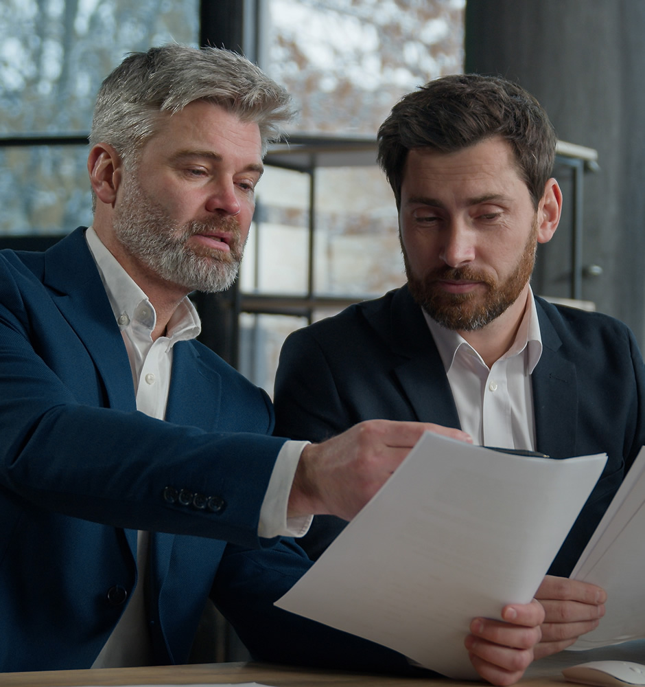 Executive caucasian men businessmen team business partners colleagues working on financial