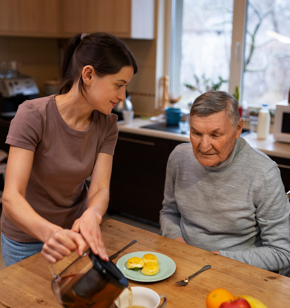 Female caretaker with client at home doing her job